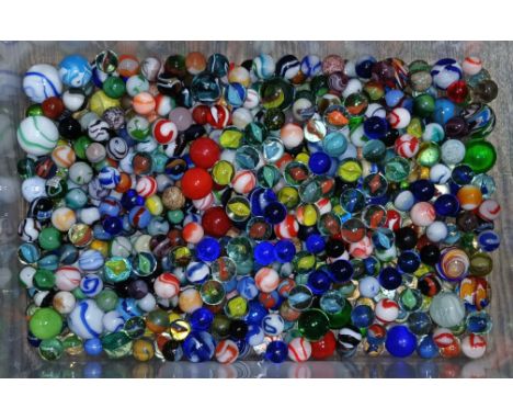 A box of assorted mainly glass marbles, various designs and sizes.