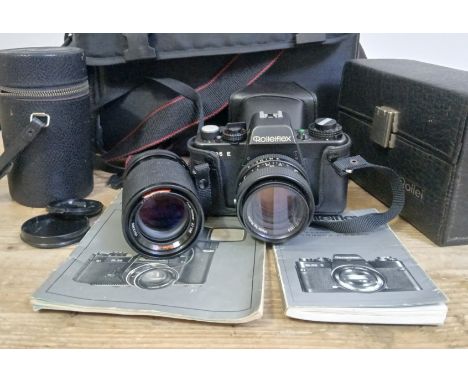 A Rolleiflex SL35 E camera with two Rollei lenses; Planar 1,8/50mm and Tele-Tessar 4/135mm, with soft bag and accessories.Con