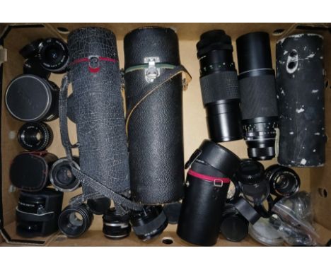 A box of assorted camera lens including Tamron, Yashica, Honeywell Pentax, Pentax Asahi etc.