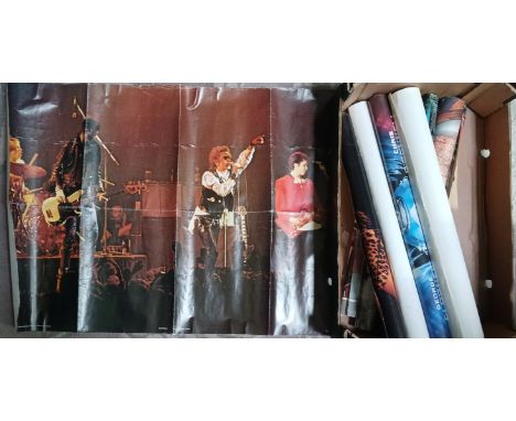A box of film and music posters including Sex Pistols and Jim Morrison etc.
