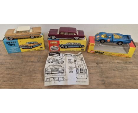 Three Corgi Toys diecast models comprising of a Chevrolet "impala" 248, Mercedes Benz 600 pullman 247 (with instructions) & a
