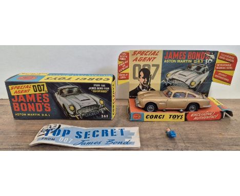 A Corgi Toys James Bond 007 Aston Martin D.B.5 261, with instructions, spare figure & in original box.Condition:- Both car an