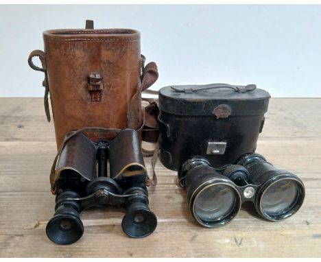 Two pairs of binoculars; Ross Prism dated 1901 and a pair of field type binoculars with compass.