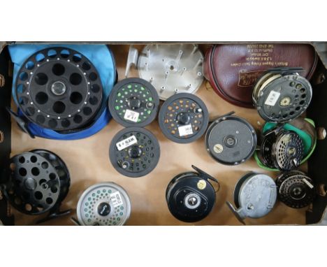 A box containing nine assorted fly fishing reels comprising The Little "Kraka", Daiwa, Shakespeare Super Condex, Intrepid Rim