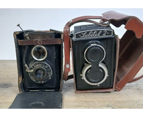 Two vintage medium format cameras; Voigtlander Brilliant and Lubitel 2.