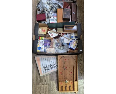 Two boxes of assorted vintage toys and games to include dominoes, various card sets, treen, mini bagatelle, xylophone etc.