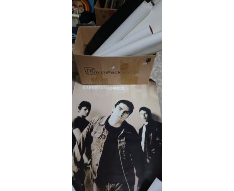A box of assorted film and music posters including Stereophonics, X-Files, Wolverine etc.