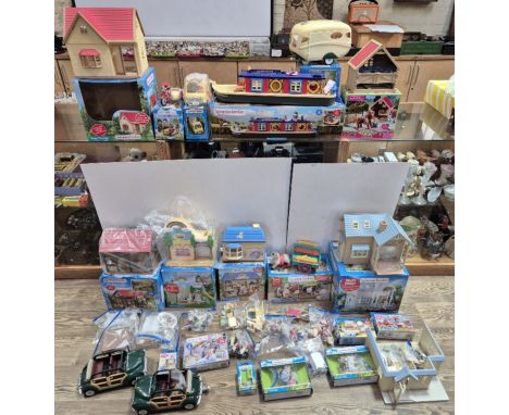A large collection of Sylvanian Families toys including buildings (many with original boxes) figures &amp; accessories, barge