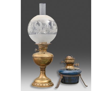 A Victorian oil lamp, the brass burner on kingfisher blue glass font, 19cm h and a brass oil lamp&nbsp;(2)  Glass in good con