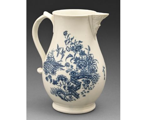 A Caughley mask jug, c1770-90, transfer printed in underglaze blue with The Fence pattern, 18.5cm h, printed C in underglaze 