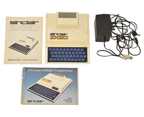 A Sinclair ZX80 home computer, complete with original assembly instructions and operating manual, power lead and adaptors  Un