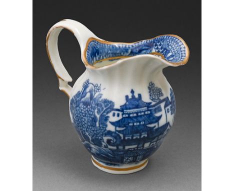 A Caughley fluted cream jug, c1782-92, transfer printed in underglaze blue with the Pagoda pattern, 96mm h  Provenance: Bill 