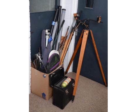 An iron mounted stained wood tripod, 135cm h, walking sticks, fishing rod storage tubes, landing nets, tennis rackets, etc 