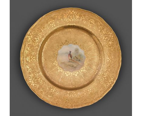 A Royal Worcester plate, 1958, painted by Leighton Maybury, signed, with a pheasant reserved on a richly gilt acid-etched gro