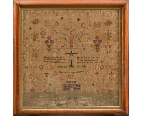A George IV linen sampler, Bessy Jones aged 13, 1829, worked with Adam and Eve, Jesus on the cross, verse, a house and variou