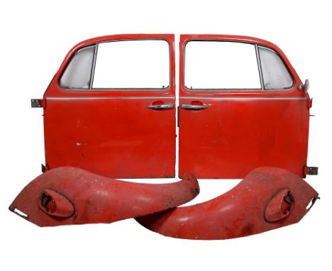 Two VW Beetle doors, two wings and wheel hub caps 