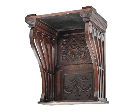 A mahogany and carved oak clock bracket, 47cm h; shelf 16 x 40cm  made up c1900 from different elements; good condition