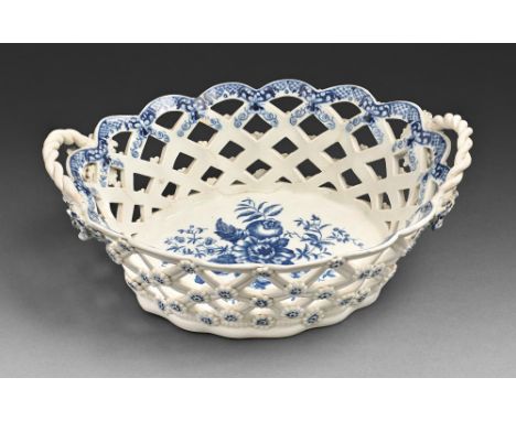 A Caughley basket, c1777-90, transfer printed in underglaze blue with the Pinecone pattern, 24cm l, printed C in underglaze b