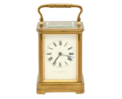A French brass carriage timepiece, Sir John Bennett, Paris, early 20th c, with enamel dial and blue steel hands, retaining th