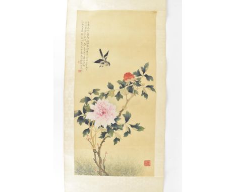 A 20th century Chinese watercolour on silk scroll painting of peonies and bird, inscribed and with red seal mark to right edg