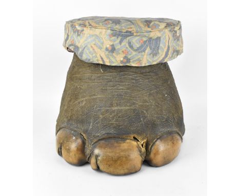 A taxidermy elephant foot stool, circa 1900, with horse hair stuffed seat 36 cm high x 34 cm wide 