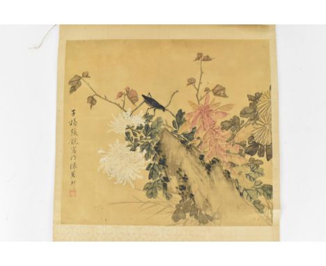 A Chinese watercolour on silk scroll painting of chrysanthemums, inscribed and with red seal mark to left edge, 31 cm high x 