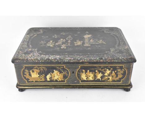 A Chinese export black lacquer and mother-of-pearl inlaid jewellery casket, of rectangular form with hinged lid, the top with