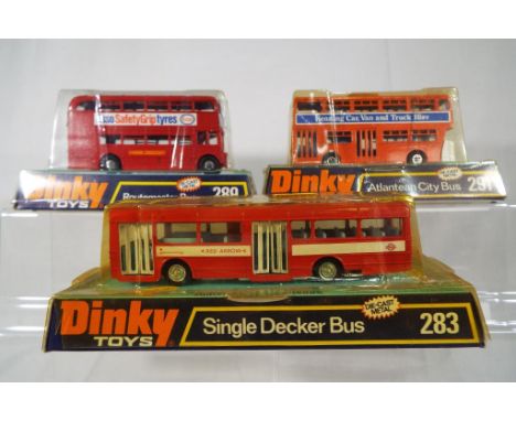 Dinky Toys - Routemaster Bus # 289. Red body, 'ESSO Safety Grip Tyres' logo and other decals intact. Driver and condutor stil