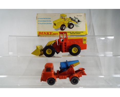 Dinky Toys - An Albion Lorry Mounted Cement Mixer # 960. Orange cab and chassis with blue and yellow mixer (mixer possibly re