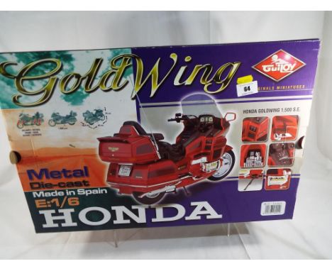 A metal diecast 1:6 scale model of a Honda Gold Wing 1.500 SE by GuiToy, appears mint in box with all original packing pieces