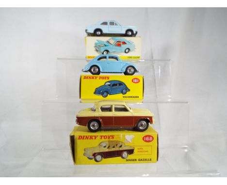 Dinky Toys - Ford Escort #168. Pale blue body, red interior, cast hubs in original picture box. Model excellent, box vg.  Sin