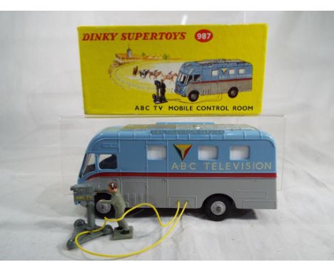 Dinky Supertoys - ABC Television Mobile  Control Room, # 987, blue/red/grey body, grey hubs, with camera on stand, cameraman 