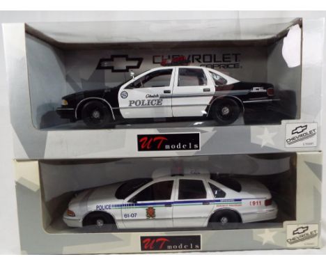 UT Models - two 1:18 scale diecast models, North American police cars, Canada and Glendale, both mint in box [2] - Est £30 - 