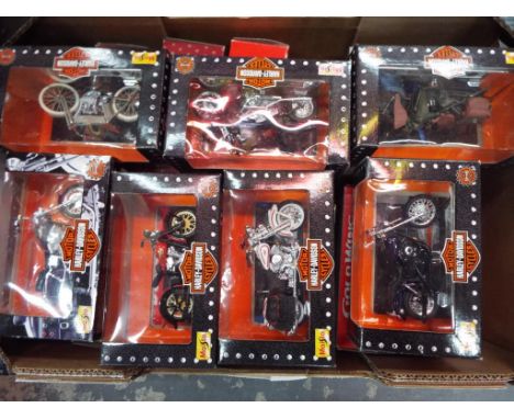 Maisto - a collection of approximately 21 diecast 1:18 scale model motorcycles to include many Maisto Harley-Davidson Cycles,