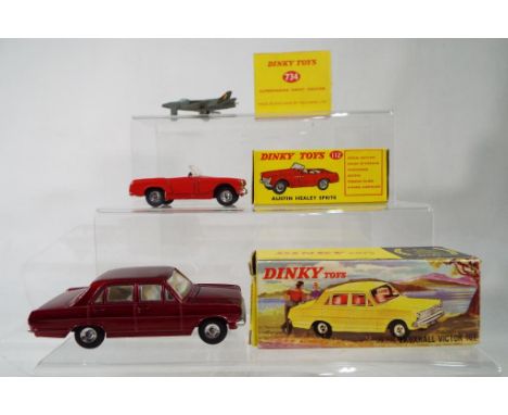 Dinky Toys - # 112 Austin Healey Sprite, red body, cream interior and windscreen, excellent condition (re-sprayed) with origi