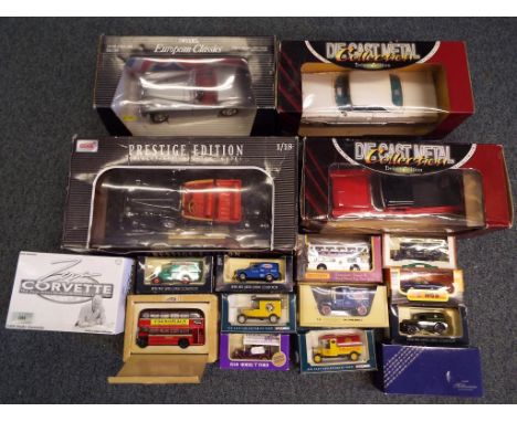 Lot to include four large scale die-cast vehicles 1:18 scale. Models include a 1948 Jaguar XK120, a 1964 Mercury Marauder, a 