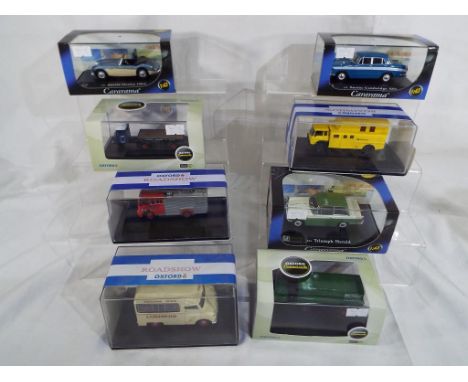 Oxford diecasts - three Oxford Roadshow diecast model motor vehicles in transparent cases with outer packaging, two Oxford Co