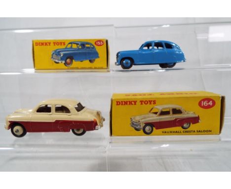 Dinky Toys - # 164 Vauxhall  Cresta Saloon, two tone red and cream body, cream hubs with original excellent correct spot box 