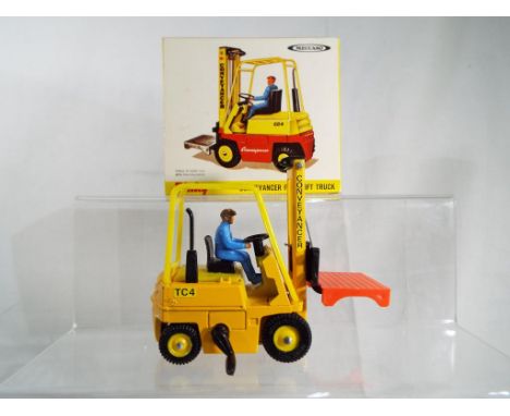 Dinky Toys - Conveyancer Fork Lift Truck, # 404, with orange and yellow body and CG4 decal, in original box with packaging pi