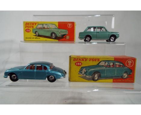 Dinky Toys - # 138 Hillman Imp Saloon, light green body, fitted interior with windows, opening bonnet containing green suitca