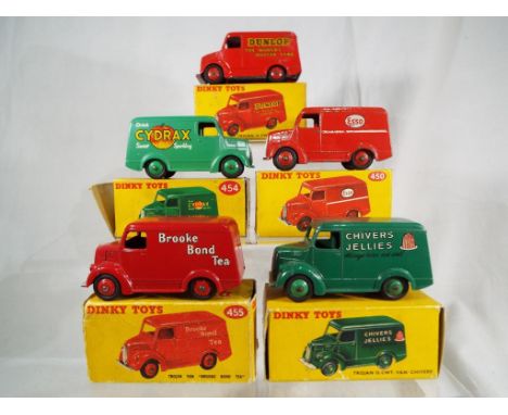 Dinky Toys - # 450  Trojan 15 CWT. Van "ESSO". Red with red hubs, appears good with some wear to the logo, excellent box. # 4