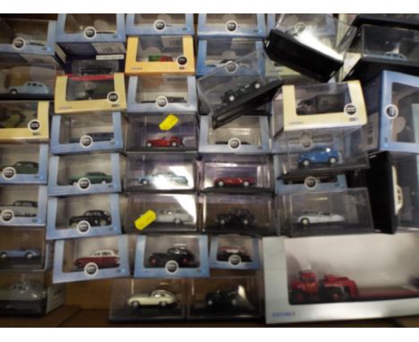 Diecast - a collection of approximately 51 diecast model motor vehicles by Oxford Automobile Co. scale 1:76,  all in transpar