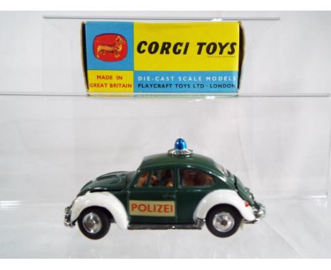 Corgi Toys - Volkswagen European Police Car # 492 , dark green body with white wings and jewelled headlights, spun hubs with 