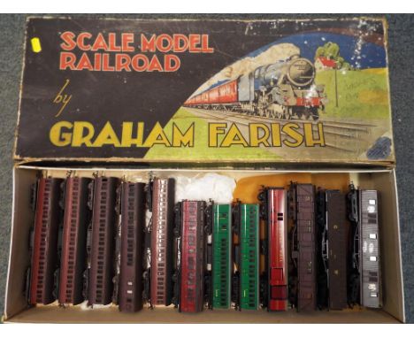 Model railways - a Graham Farish model railroad box containing eleven OO gauge passenger carriages and a Hornby Dublo tin pla