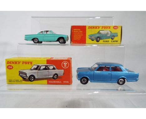 Dinky Toys - # 136 Vauxhall Viva, blue body with red fitted interior and windows, opening boot and bonnet with original excel