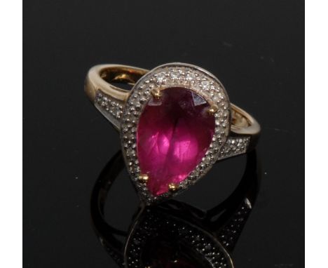 A Shimoyo rubellite and diamond pear drop cluster ring, central pink pear rubellite, 2.66ct, surrounded by a twenty six diamo