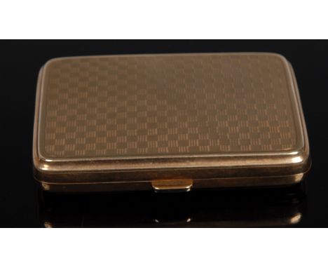 A 9ct gold rounded rectangular cigarette case, engine turned checkered pattern exterior, B H Britton & Sons, Chester 1924, 84