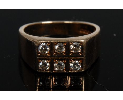 A six stone diamond ring, rectangular platform set with two rows of three round brilliant cut diamonds, 9ct gold shank, size 