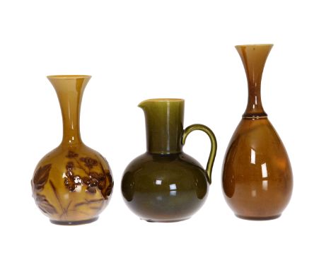 LINTHORPE POTTERYTWO VASES AND A JUG, NOS. 1414, 1160 AND 666, the first slip decorated with foliage by Fred Brown, the secon