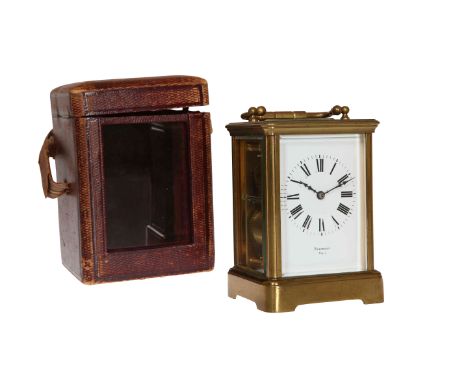 A FRENCH BRASS CASED CARRIAGE CLOCK, signed MARGRETT/ PARIS, the white enamel dial with Roman numerals, backplate stamped 282